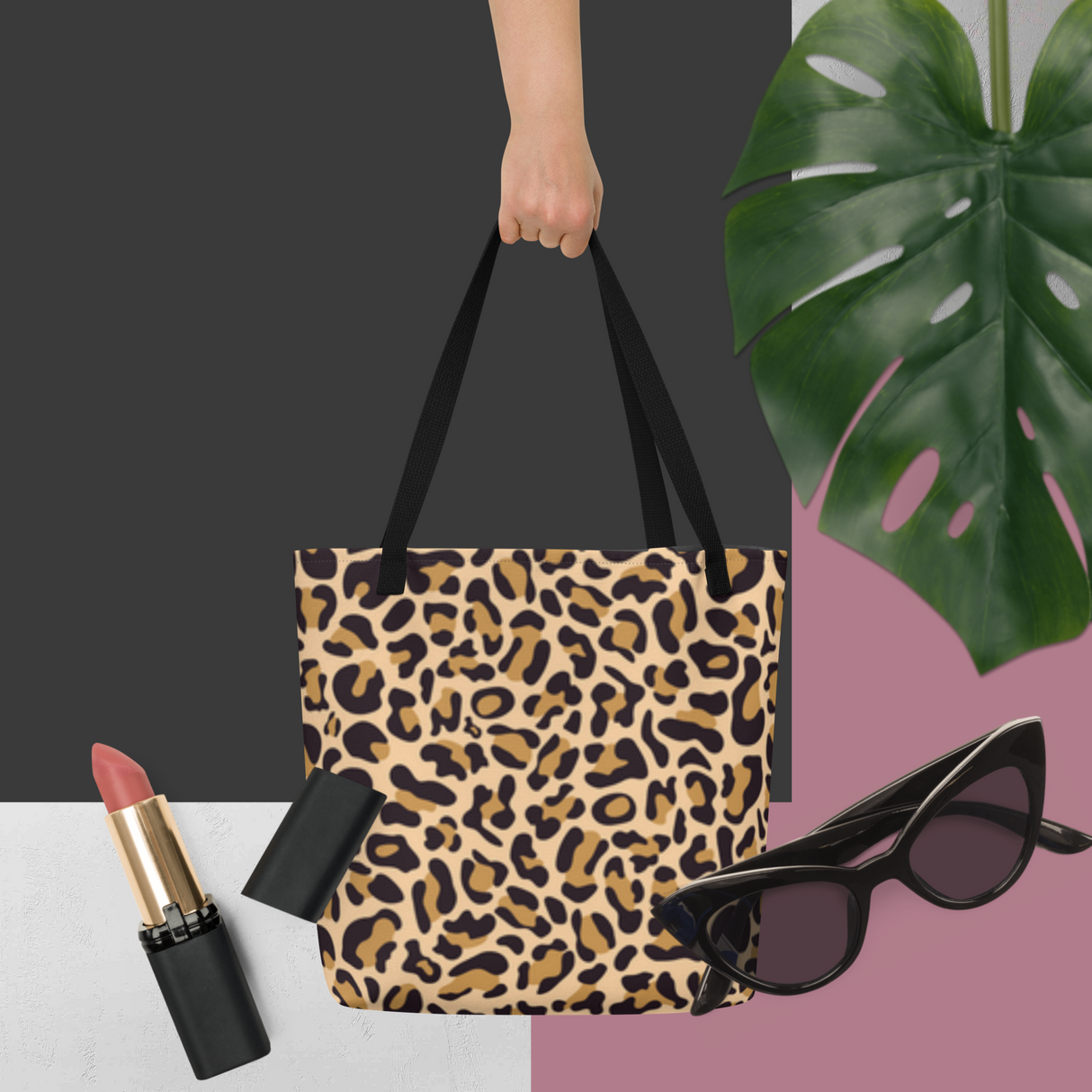 Leopard print tote bag held by a person, with lipstick and sunglasses on a split background