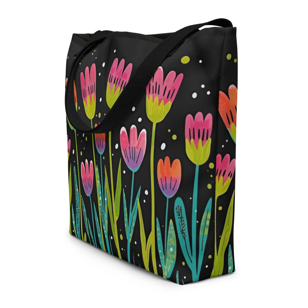 Black tote bag with colorful tulip pattern on a white background