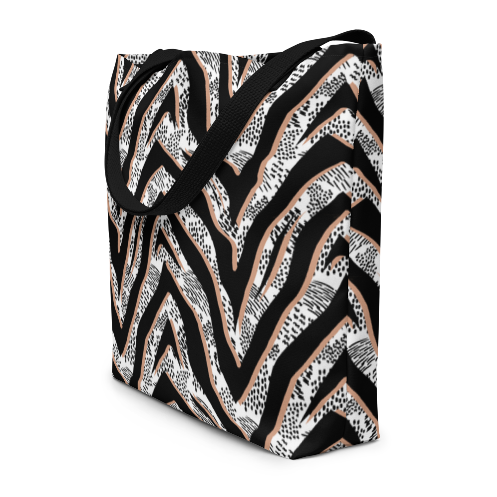 Tote bag with black and white chevron pattern on a white background