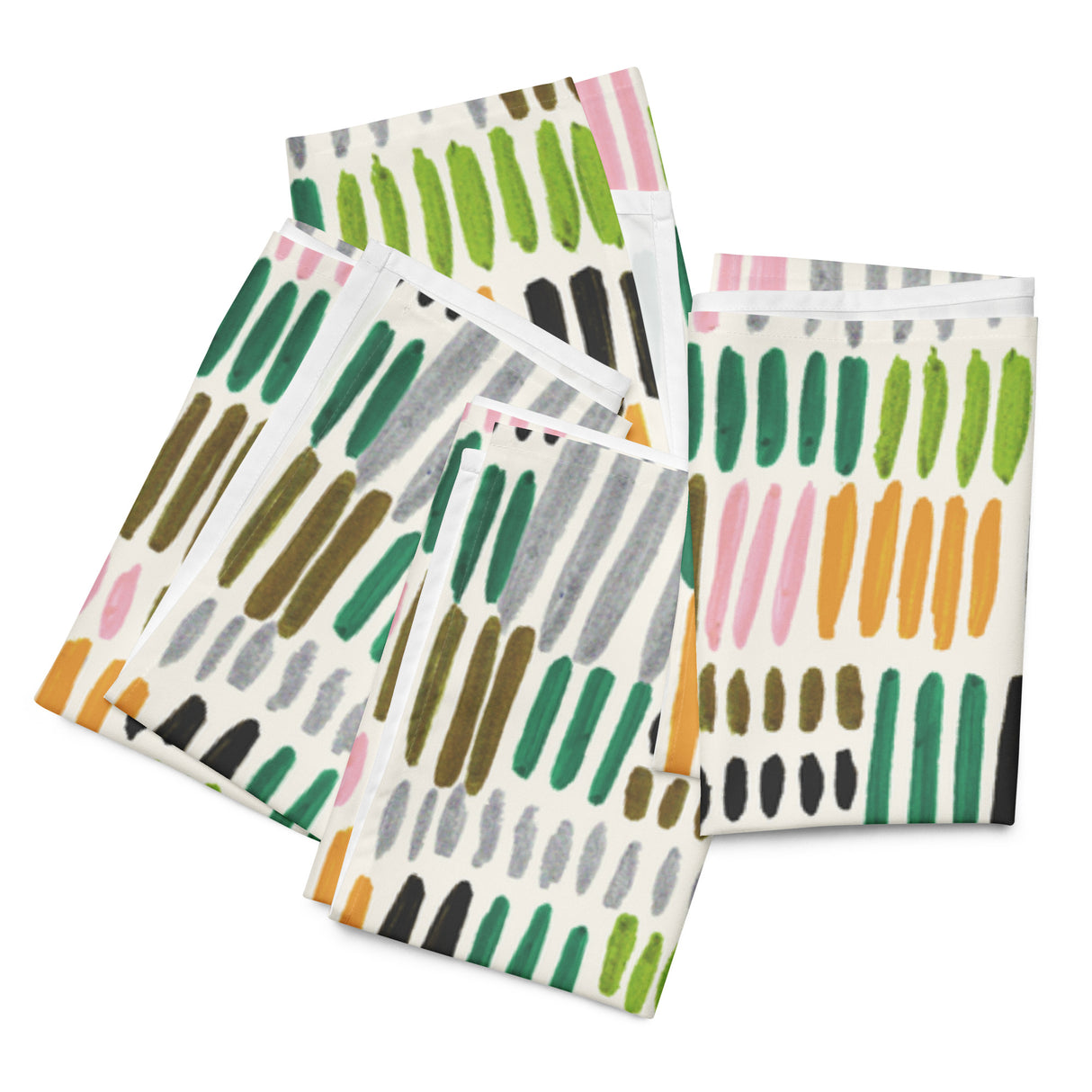 Set of four colorful patterned napkins on a white background