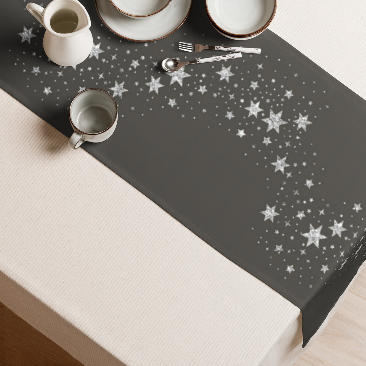 Table runner with star pattern on a dining table setting