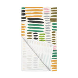 Colorful patterned paper with abstract designs on a white background